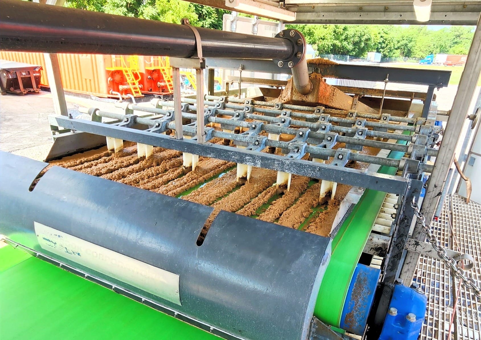 The mobile belt press running on a job site
