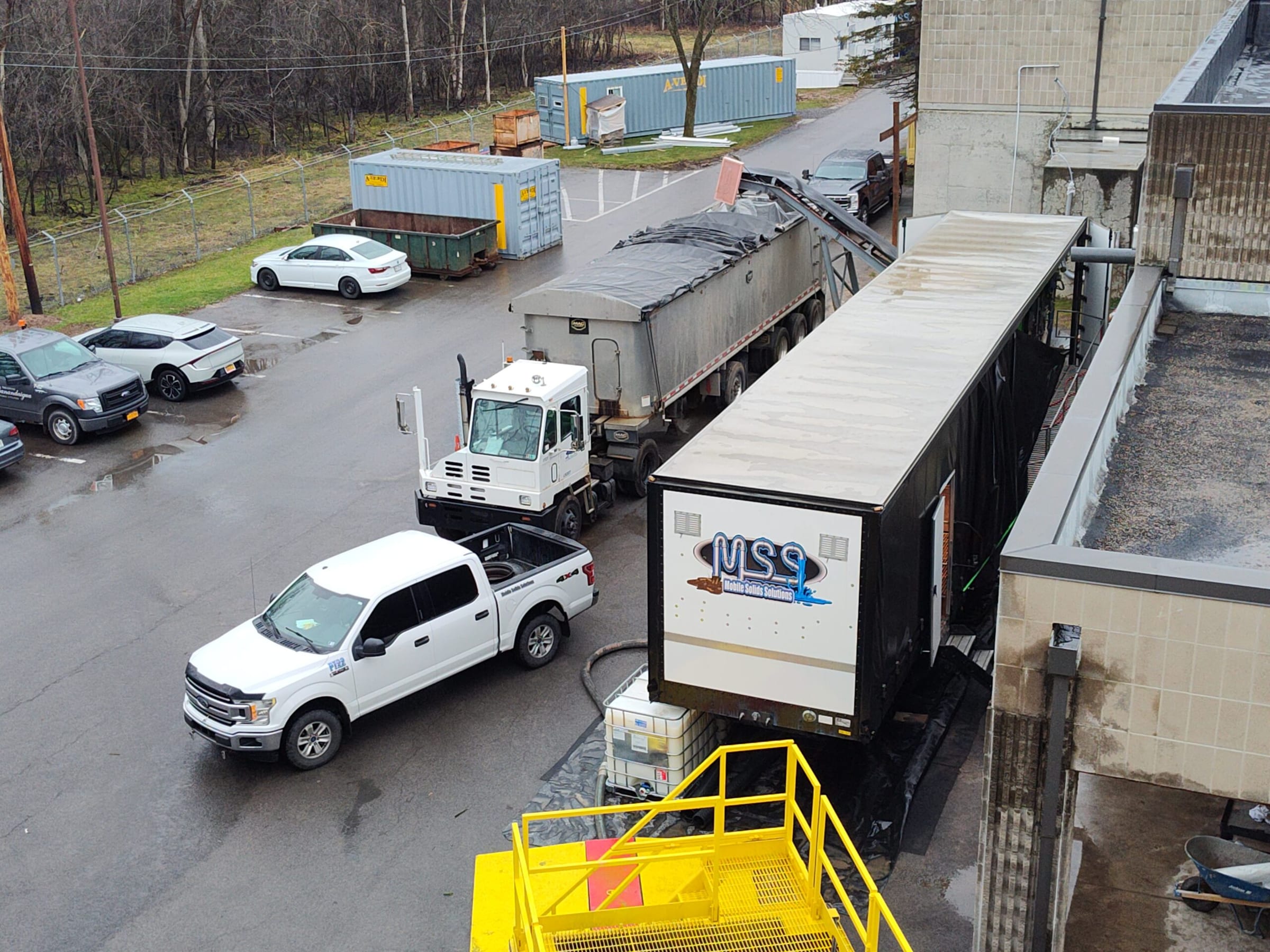 Equipment staged on arrival — nothing connected until the air comes back clean.
